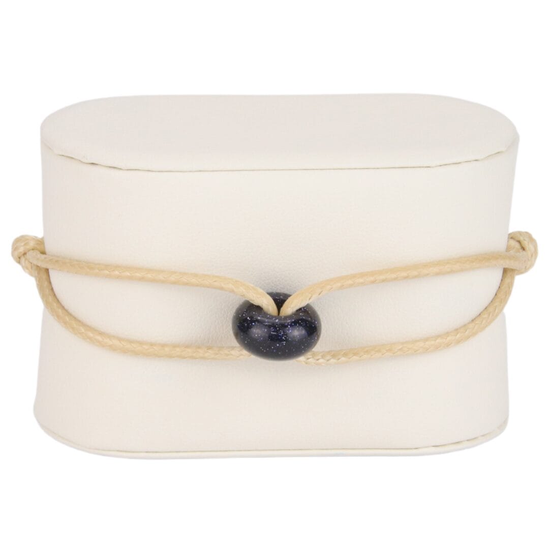 Bracelet Cordon Beige avec Perle Noire Pailletée