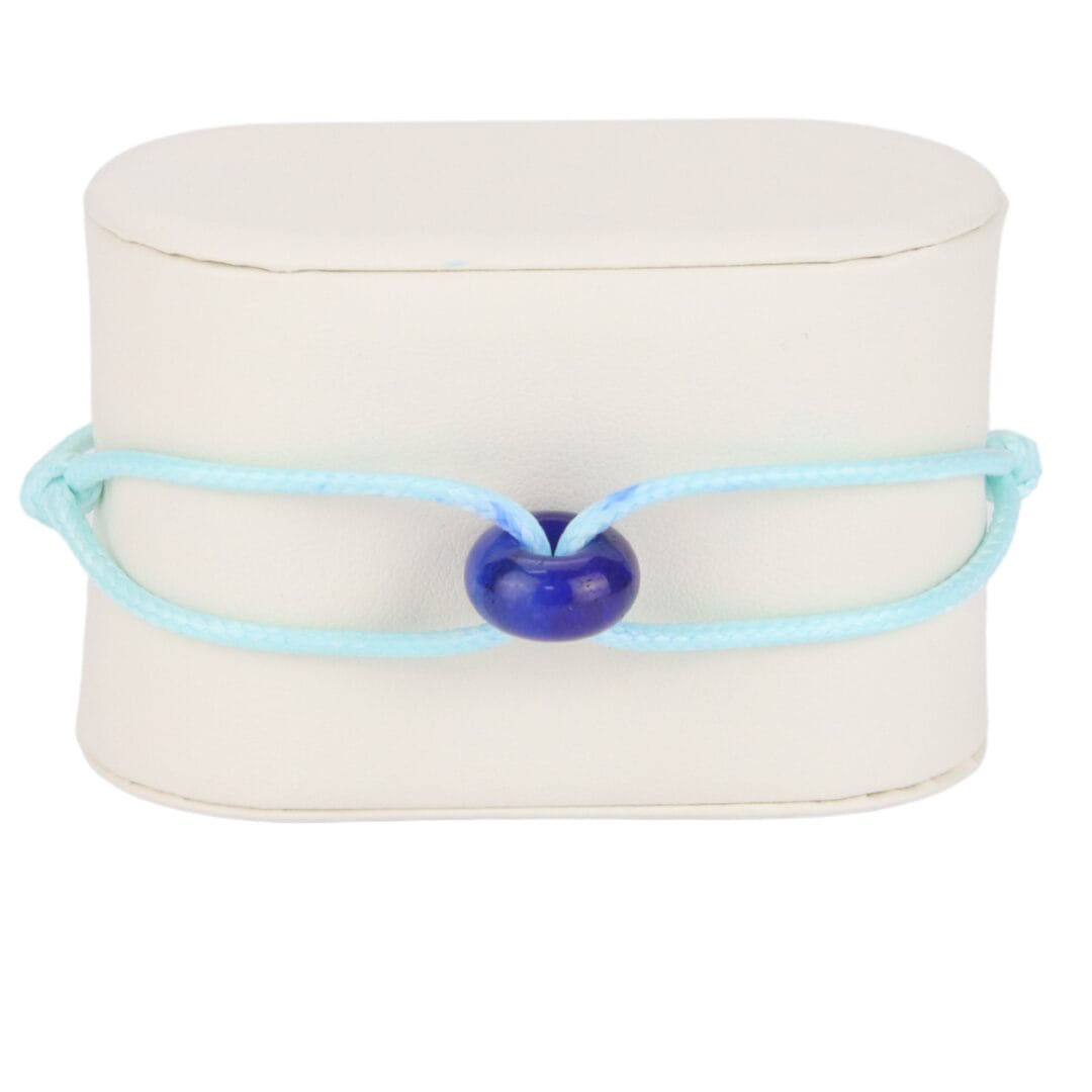Bracelet Cordon Bleu Ciel avec Perle Bleu Foncé Effet Pierre