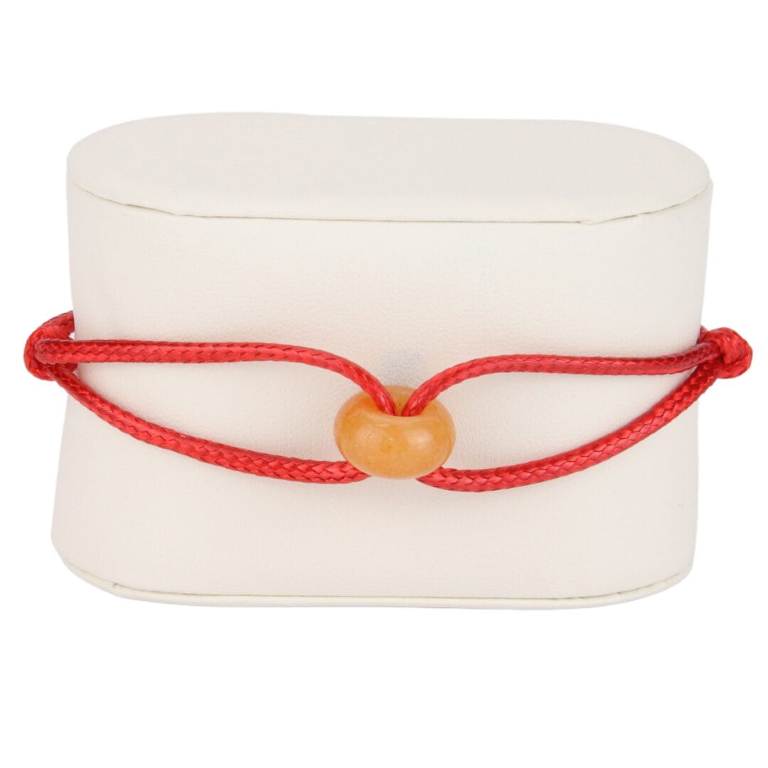 Bracelet Cordon Rouge Brillant avec Perle Orange Effet Pierre Polie